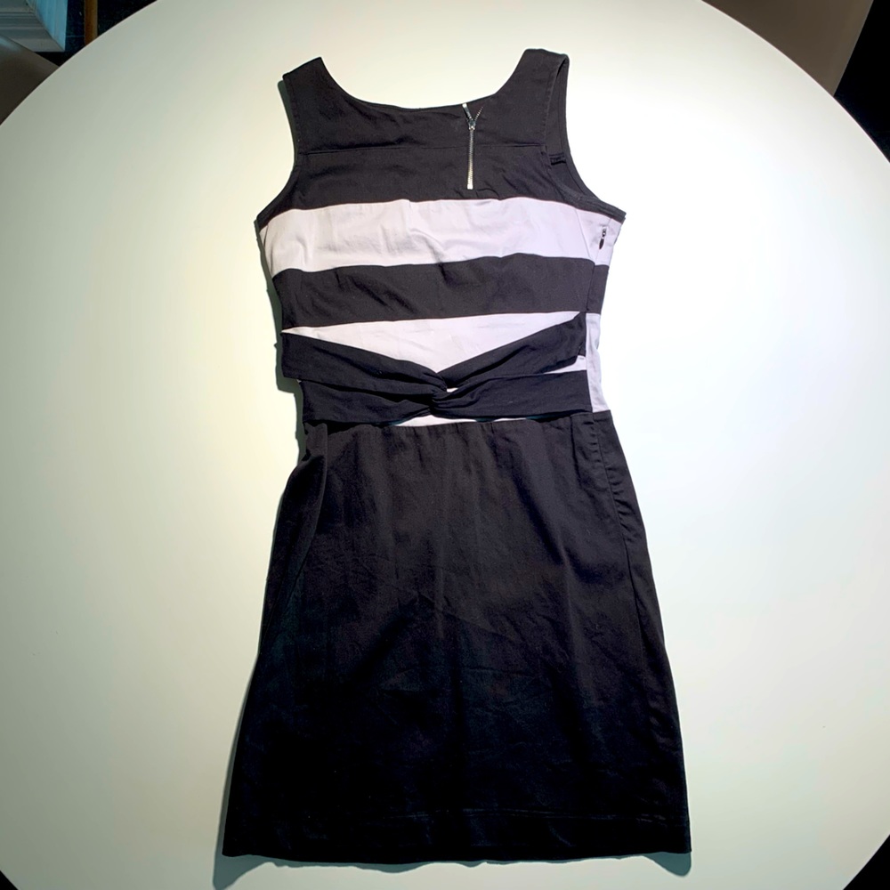 Black and pale taupe with front tie details and asymmetrical zipper detail